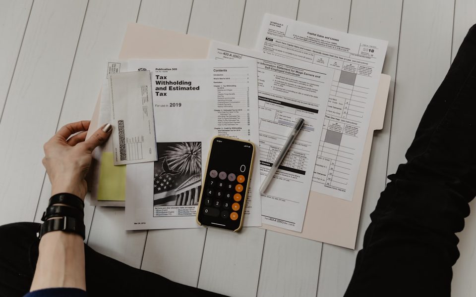 Home improvement financing paperwork and calculator