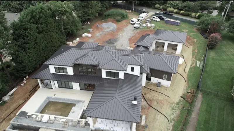 Standing seam metal roof sections on a CPR mountain-home project