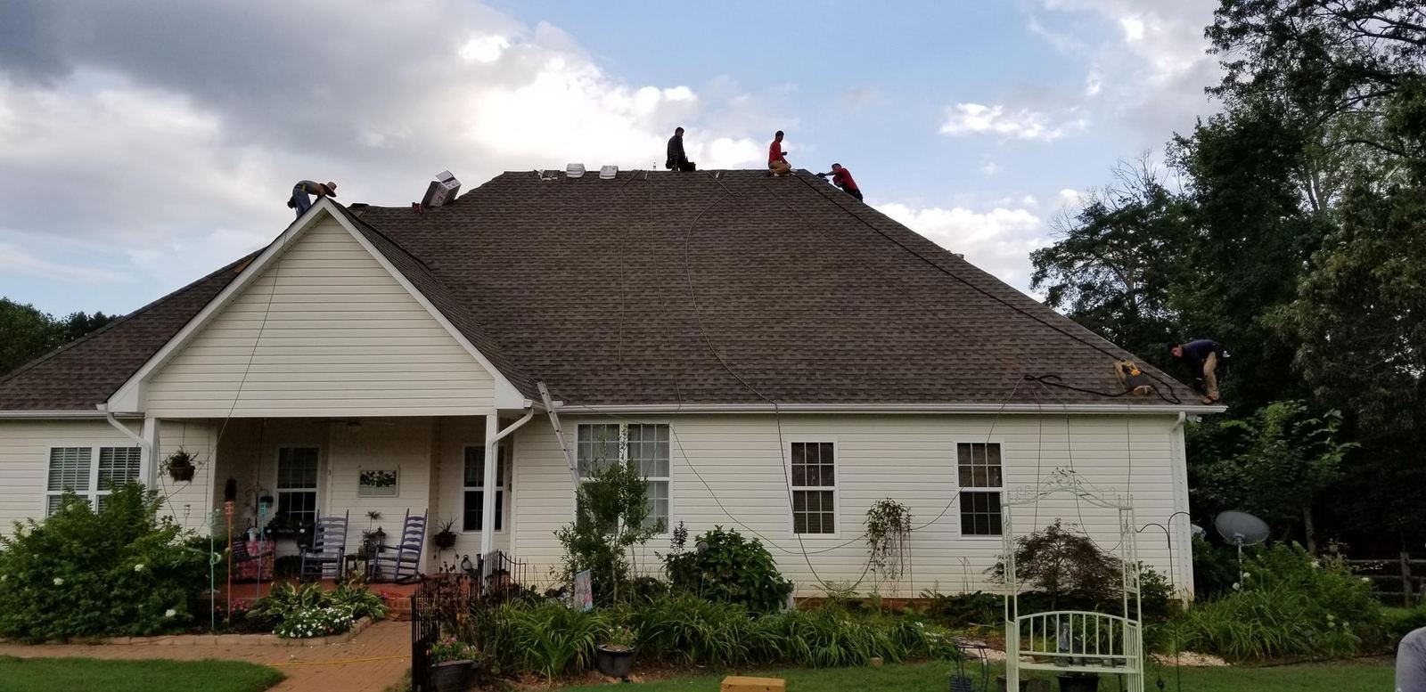 Roofing crew at work on a residential home