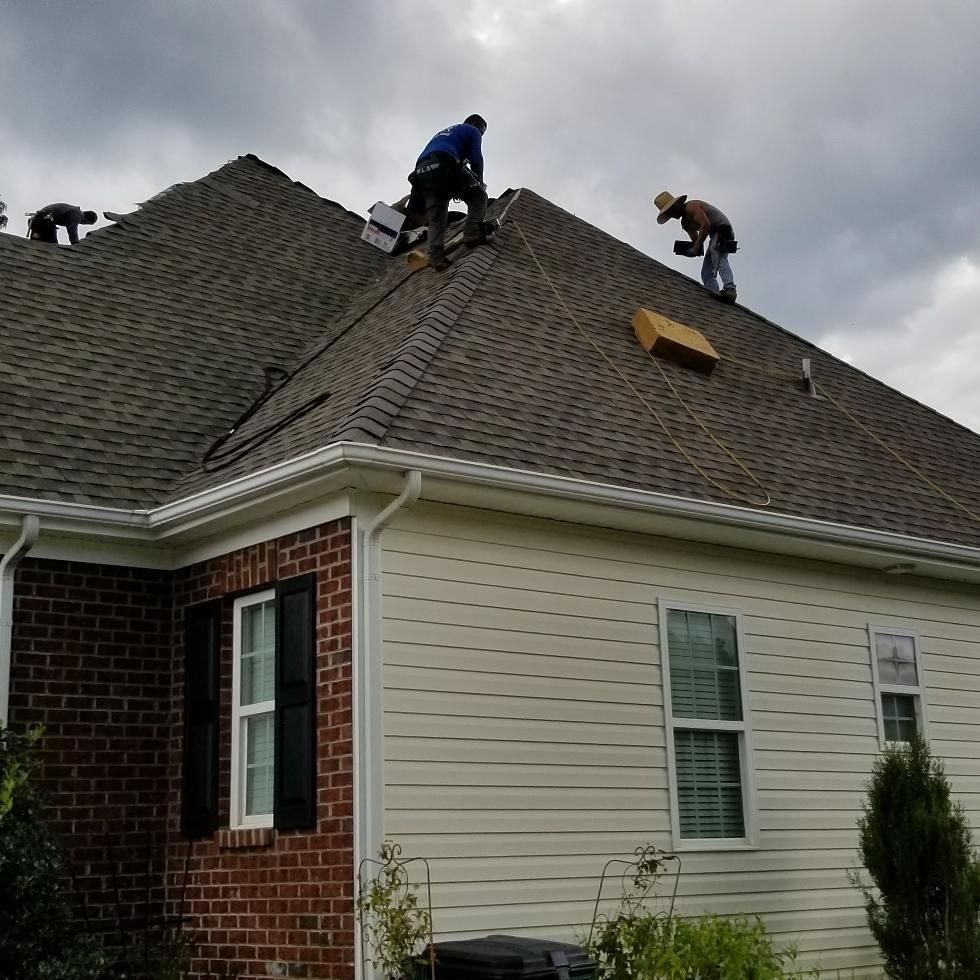 CPR crew installing GAF architectural shingles