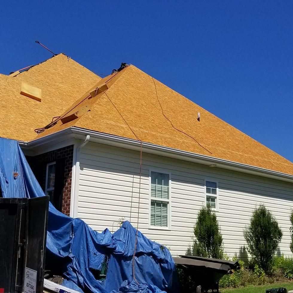 CPR crew working on a residential roof