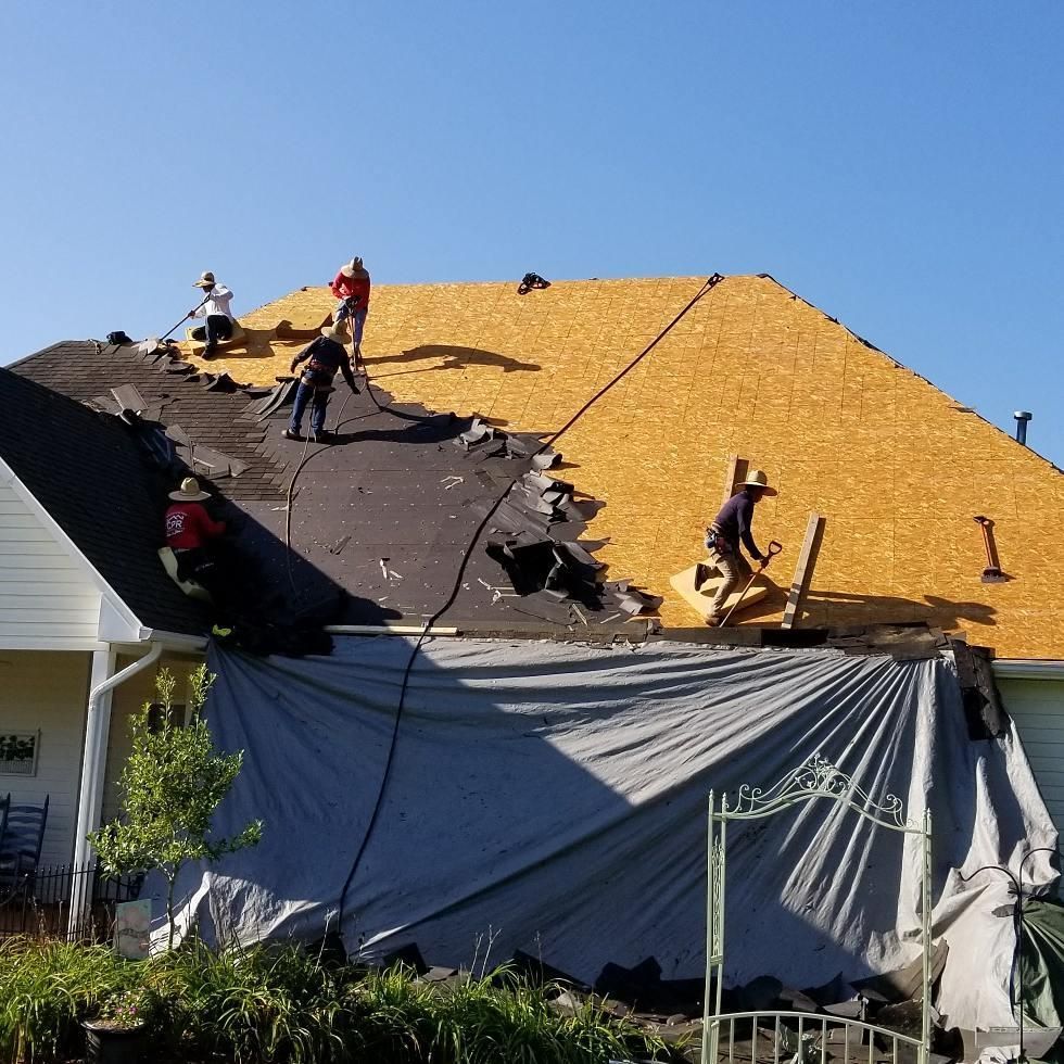 CPR crew performing a residential roof tear-off