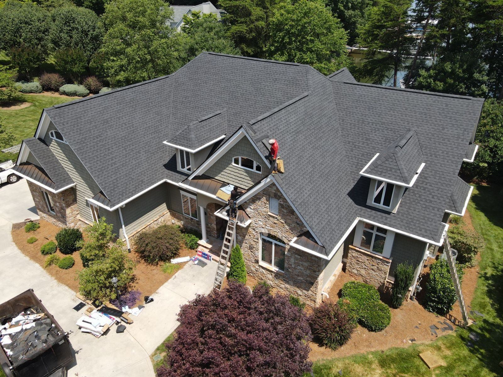 Seamless gutter installation on a residential home