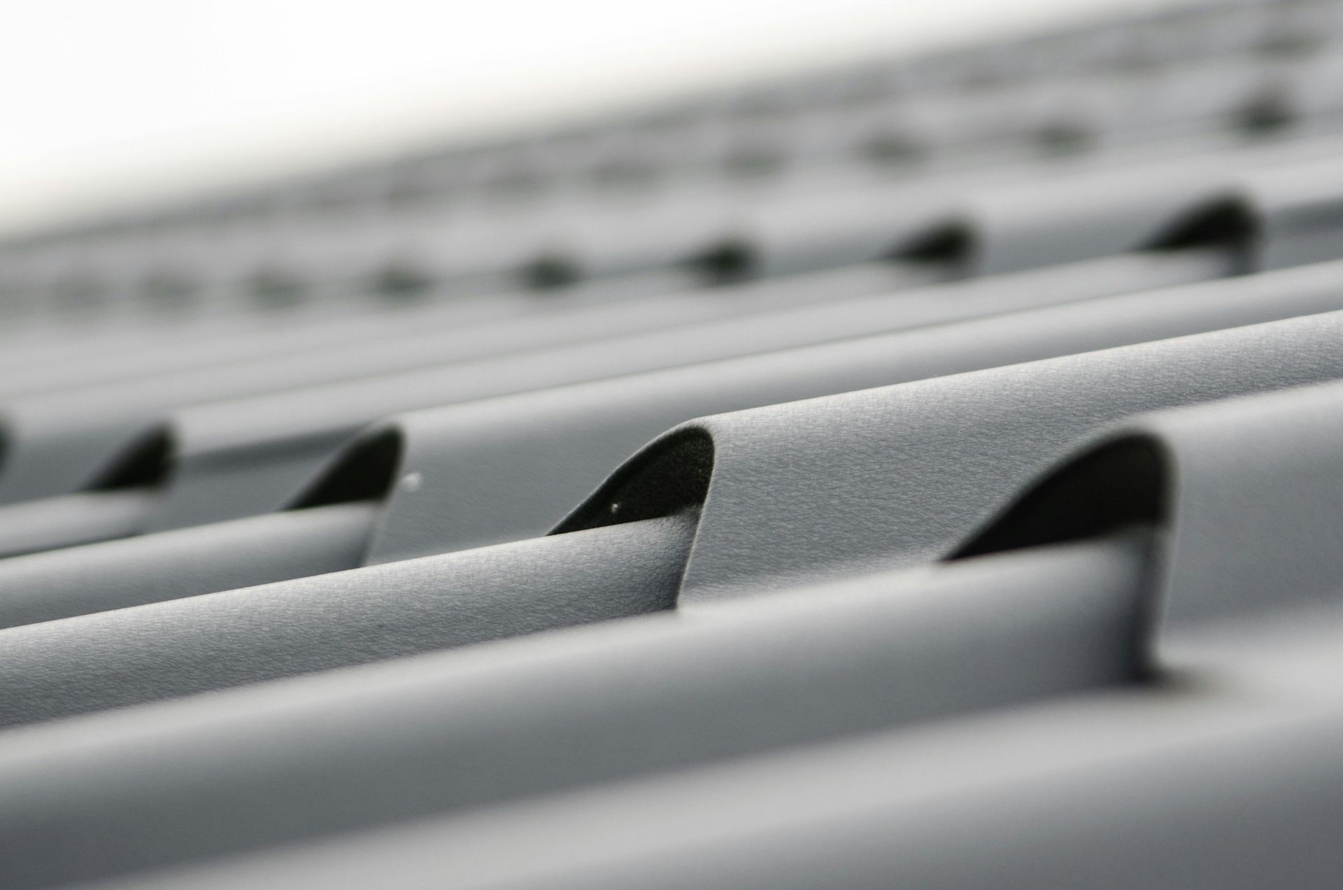 Metal and tile-style roofing materials